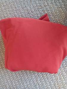 Orange Cotton Spandex - 1.23 remnant - hole in it, photographed