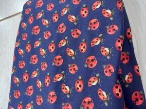 Ladybugs on blue Cotton Spandex 1.17 remnant