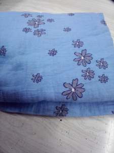 Woven: Pale blue with blue and Silver Daisy Double Gauze 100% cotton - 1 metre remnant