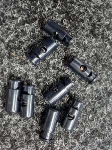 Haberdashery: 6mm Black Barrel Spring Toggles