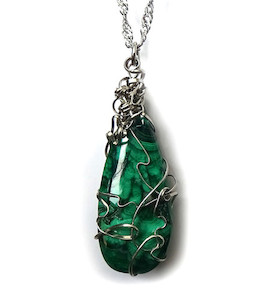 Products: Malachite / Stainless Steel pendant Fossil Studios