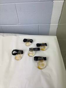 Available: SAMPLE | Yellow and Black Leather Napkin Ring Set