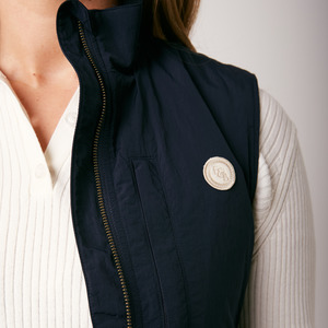 Products: Durness Waterproof Merino Vest