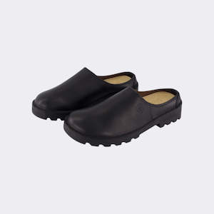 Feet: Slip on shoe in black by Commonplace X McKinlays made in Dunedin, Aotearoa
