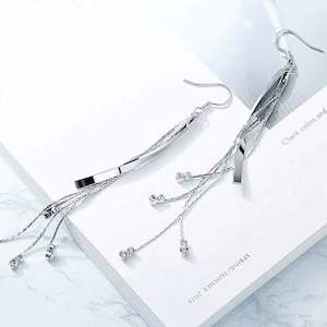 Sale: Long Silver Boho Crystal Tassel Earrings "Stella"