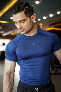 Men Compression Wear: Power Seamless T-shirt Blue/Logo
