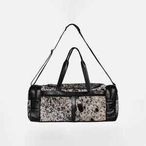 Abundance Cowhide Traveller