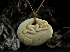 Doug Marsden: Whalerider pendant carving by Doug Marsden