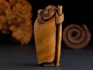 Doug Marsden: Talking with Tui carving by Doug Marsden