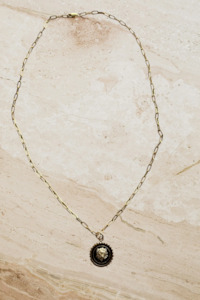 Black Lion Coin Pendant on a Paper Chain