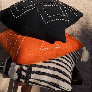 Orange Cushion with Cream Tassels