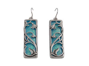 Boxed blue resin flower rhodium earrings