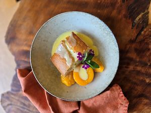 Peach & Cardamon pudding with vanilla bean custard