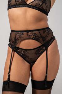 Lace suspender with sheer, floral motif.