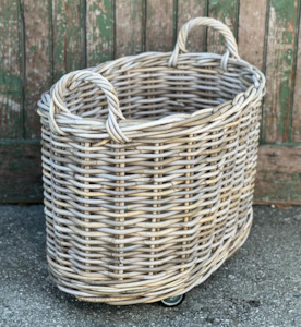 Lighting: Medium Oval Cane Basket on Wheels
