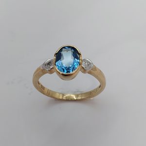 Products: 9 carat Yellow Gold Blue Topaz and Diamond Ring 7780 - Graeme Johnson Jewels & Time