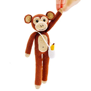 Fairtrade knit monkey toy with banana
