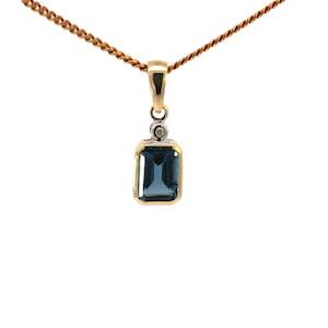 Pendants Necklaces: 9ct Gold Emerald Cut Blue Topaz & Diamond Pendant