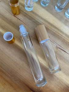 Frontpage: Clear Tall 10ml Roller bottles with Gold Cap