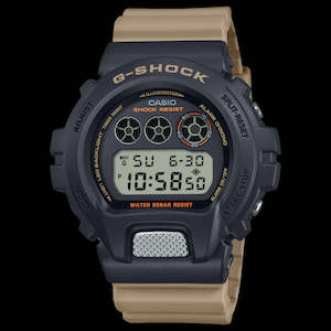 Digital G shock 200m with a brown strap and a black case