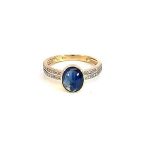Sapphire: Oval Cabochon Sapphire & Diamond Ring