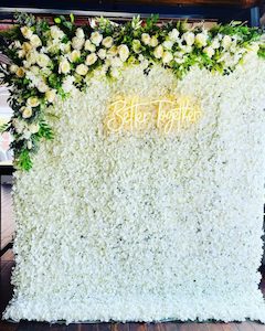 Products: White Flower Wall with corner flower arrangement