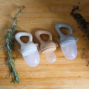 International Market: Baby Fruit Feeder - Safe Self-Feeding & Teething Relief