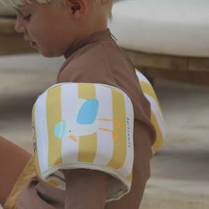 Beach Essentials: Sunnylife Kids Floaties Sammy the Seagull Mustard Stripe