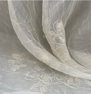 EMBROIDERED FLORAL ON A TRANSPARENT SILK BASE