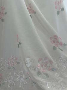 Cotton Fabric: FREYA  COTTON VOILE WITH TRANSPARENT SEQUIN BORDER OF FLOWERS