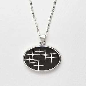 Gifts Under 500: Nick Von K Sterling Silver Matariki Pendant in Black Pounamu