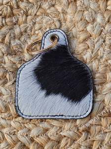 Accessories: BLACK & WHITE EAR TAG