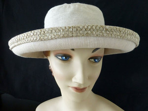 Products: S704 Summer Taupe Linen Hat with interesting contrast around the crown Hokianga Hats