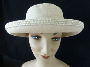 S703 summer seagrass linen hat with interesting contrast trim around the brim Hokianga Hats