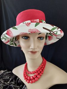 Products: R262: Pohutukawa red linen with pohutukawa floral trim reverse Hokianga Hats