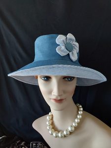 Products: R257: Lightweight denim hat with blue strip reverse and 5 petal flower trim Hokianga Hats