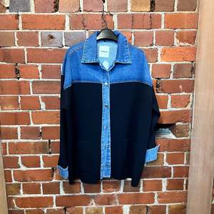 Products: SANDRO wool and denim jacket