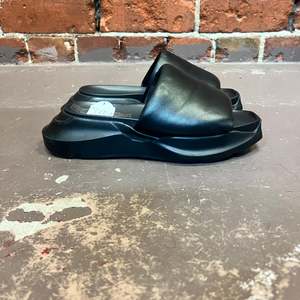 Products: RICK OWENS leather slides  39