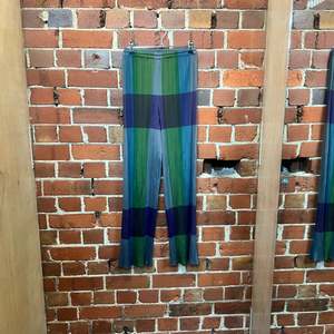 PLEATS PLEASE checked trousers