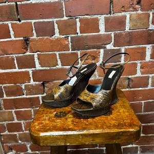 Products: PRADA lizard skin wedges 39.5