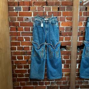 Products: Y-PROJECTS Western boot jeans By Glen martens