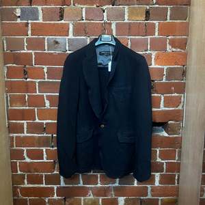 Products: COMME DES GARCONS wool crinkle jacket