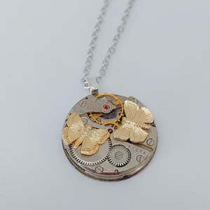 Timepiece Pendant with Golden Butterflies