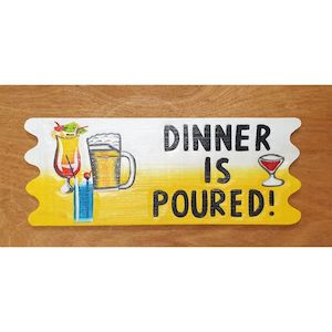 Dinner is Poured Sign