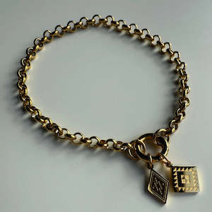 Taonga Jewelry: Rangimarie Charm Bracelet - Gold
