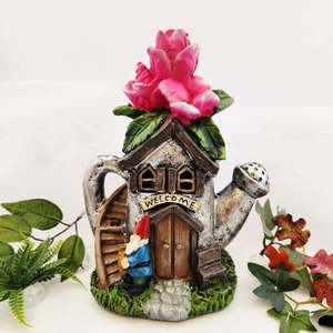 Woodland Grotto: Rodney the Gnome & His Watering Can Cottage (solar light. approx. 23x18cm)