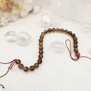 Smoky Quartz Bead Strand (approx. 21-23 x 8mm round beads)