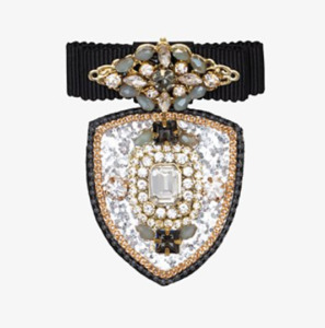 Sunglasses: Medal brooch