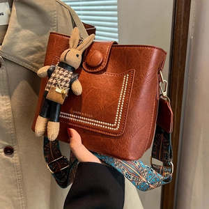 Vintage Faux Leather Crossbody Bag with Wide Strap & Bunny Charm