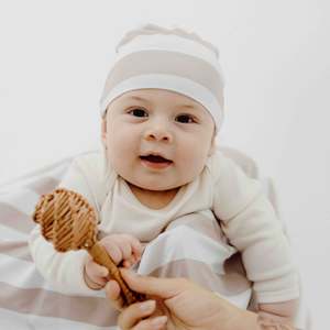 Nature Inspired Accessories: Seashell Stripe Beige Top Knot Beanie